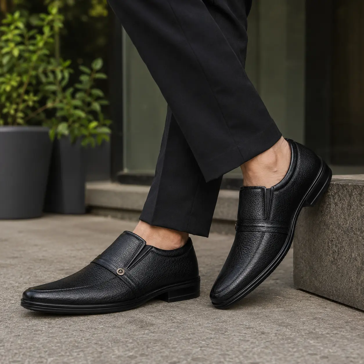 Men’s Black Formal Slip-On Shoes – Model 6002 – Lifestyle View Men’s black formal slip-on shoes, model 6002, shown being worn