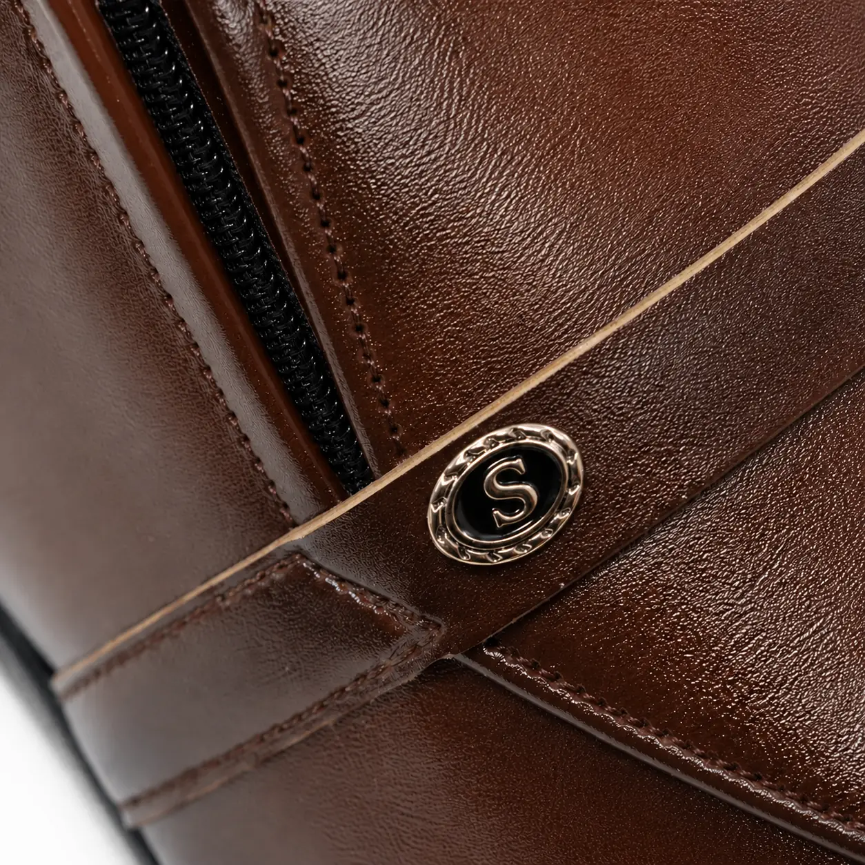 Model 6002 A9 Two-Tone Brown Material Close-Up Close-up of two-tone brown A9 material and stitching on Model 6002 slip-on shoe